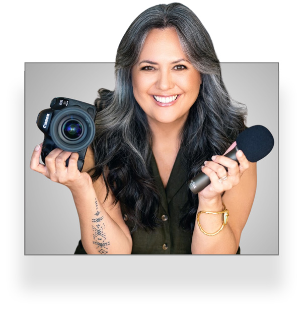 Mapuana Reed holding a camera and a microphone